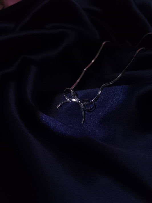 Eternal Bow: Anti-Tarnish Sterling Silver Necklace by Dilverse