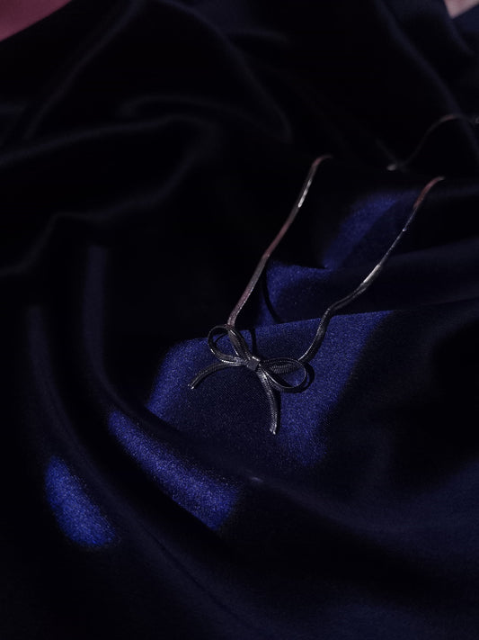 Eternal Bow: Anti-Tarnish Sterling Silver Necklace by Dilverse