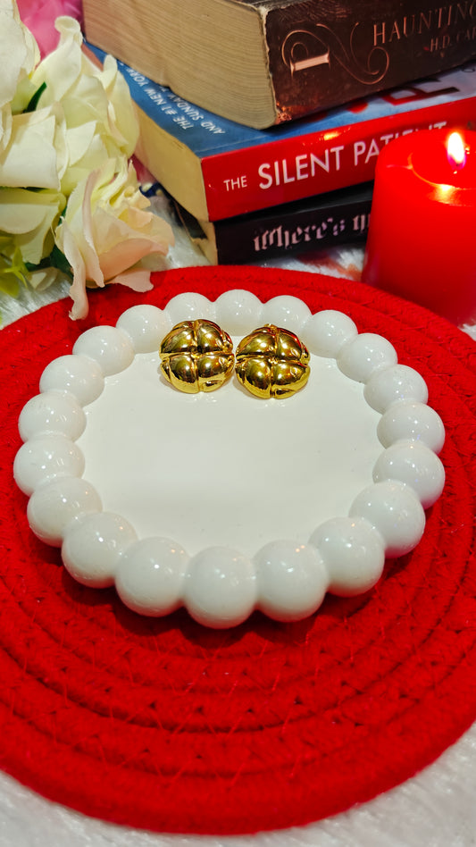 "Golden Embrace: Bold Vintage Studs to Ignite Your Story"