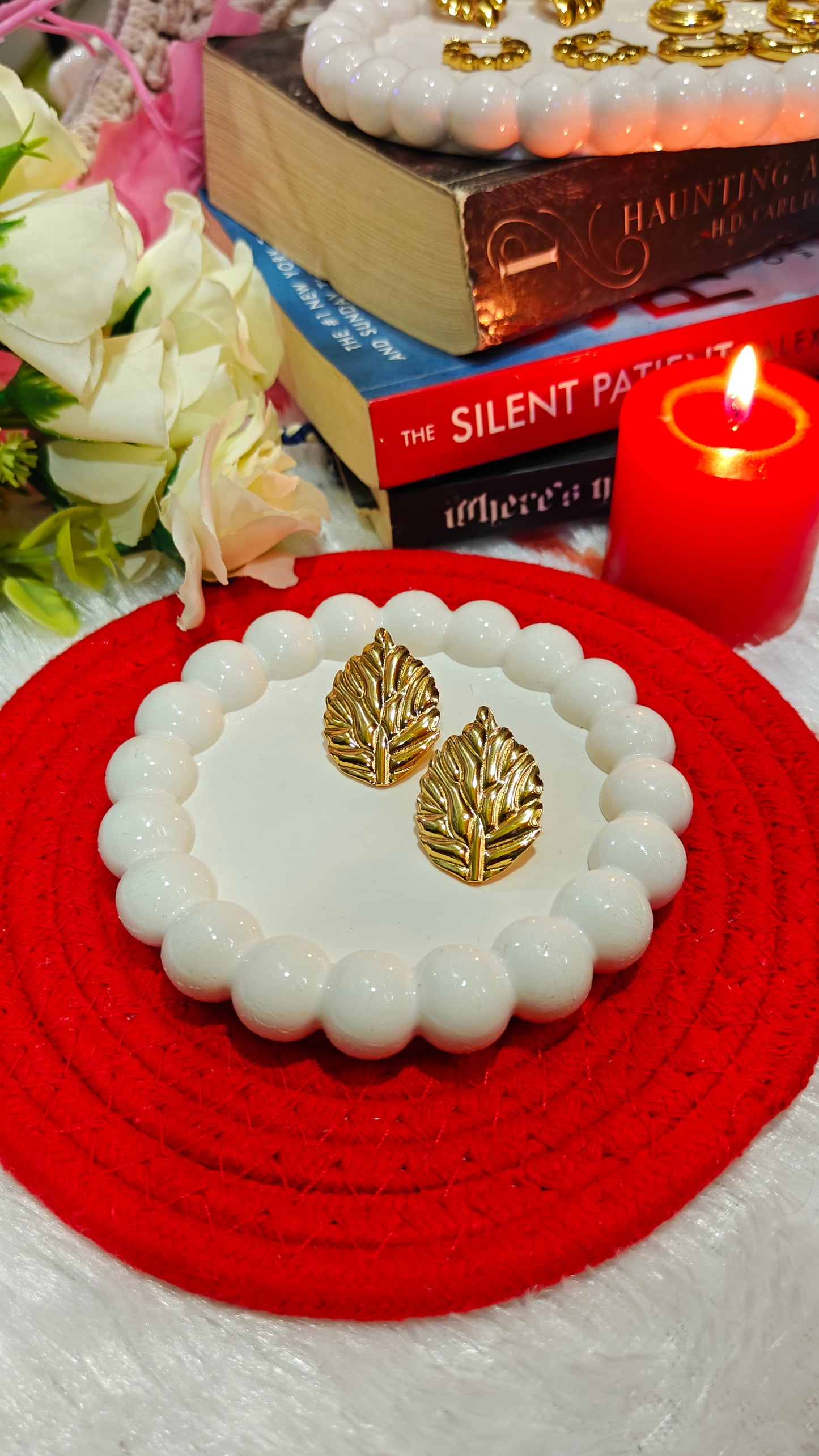 Golden Whisper: Enchanted Leaf Studs for the Bold  Beautiful