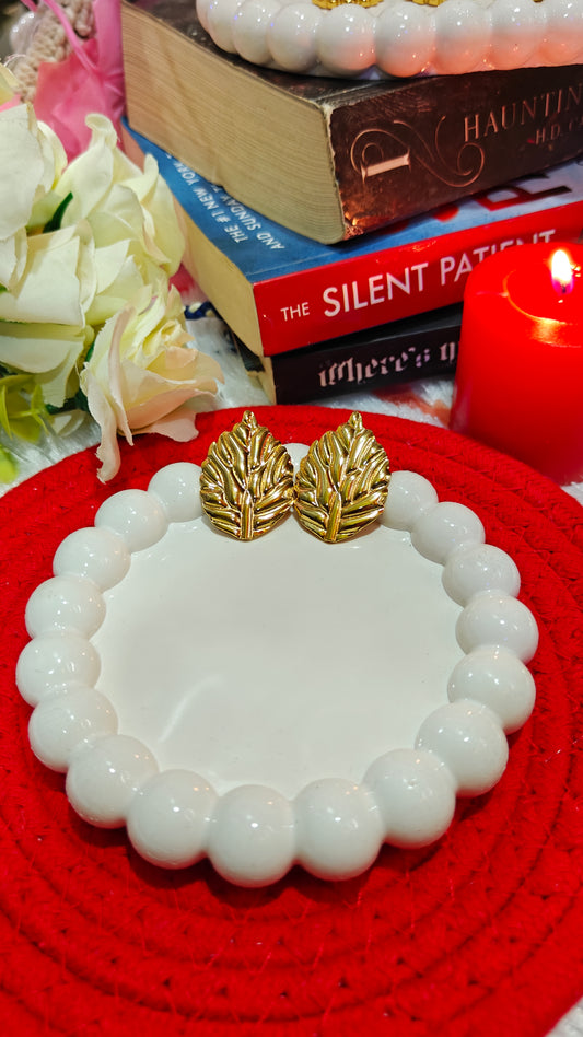 Golden Whisper: Enchanted Leaf Studs for the Bold  Beautiful