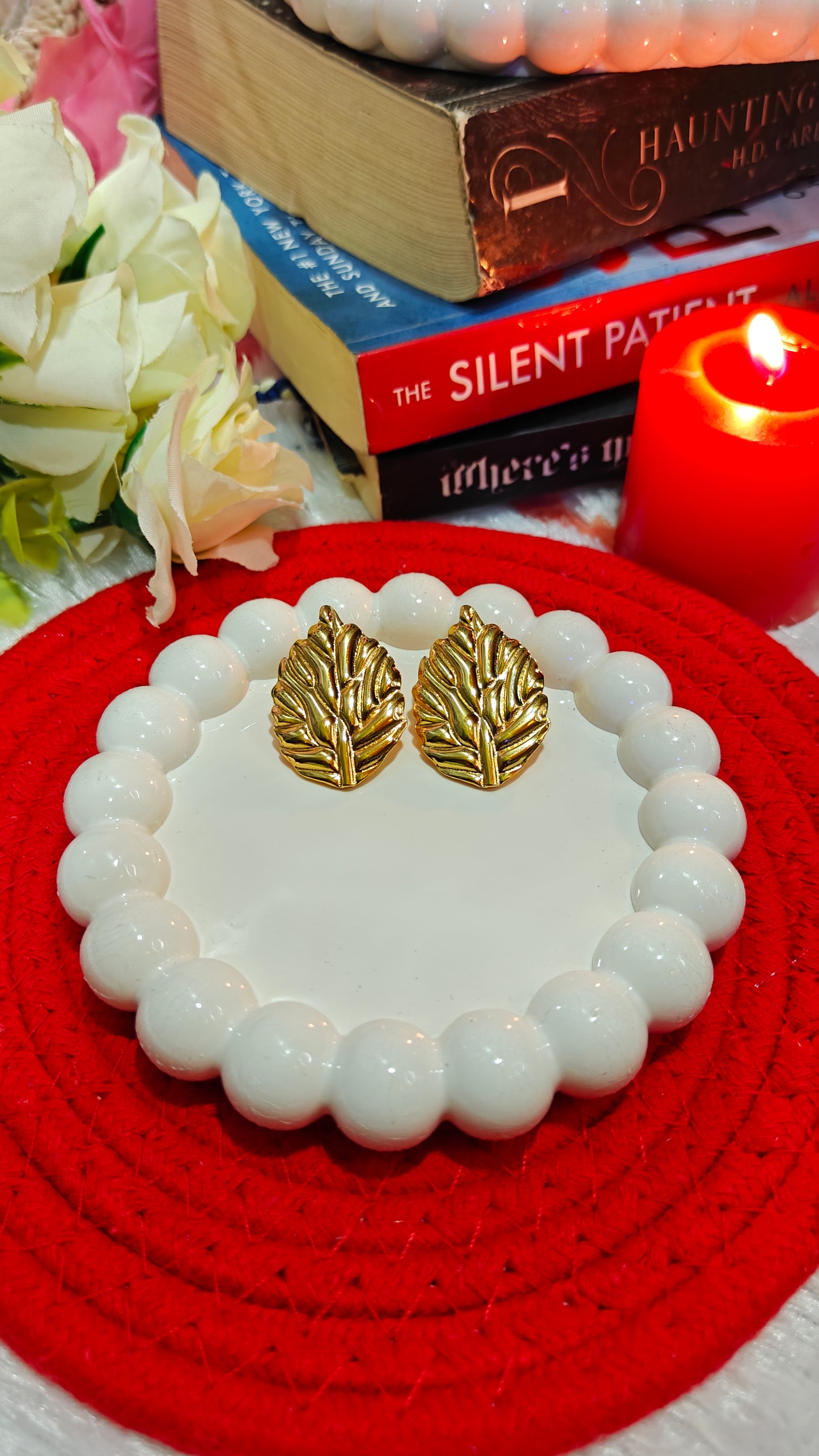 Golden Whisper: Enchanted Leaf Studs for the Bold  Beautiful