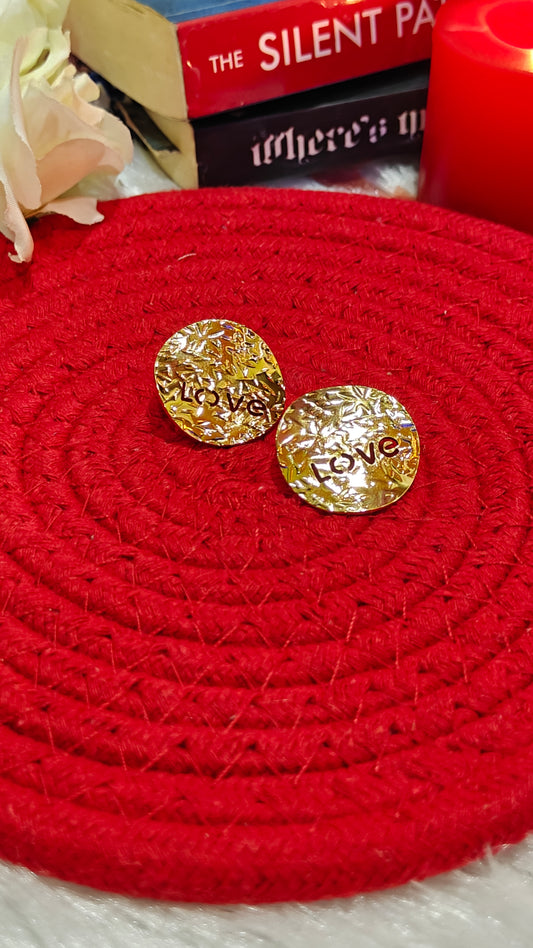 "Unapologetically Love: Textured Gold Statement Studs" at Dilverse