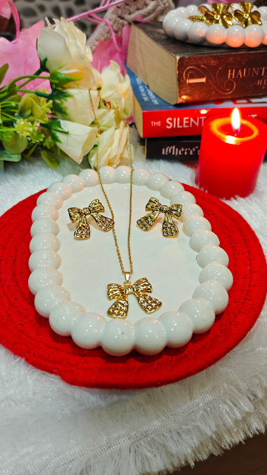 "Whispers of Love: The Enchanted Golden Bow Jewelry Set – A Promise Wrapped in Elegance"