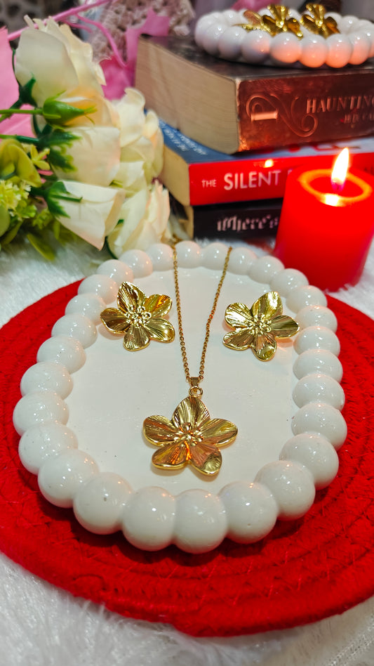 "Golden Blossom Symphony: A Necklace  Earrings Set That Celebrates Your Unique Story"