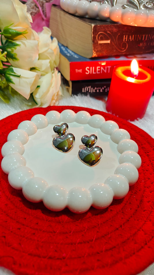 "Silver Whisper: Drop Earrings That Ignite Romance  Radiance"