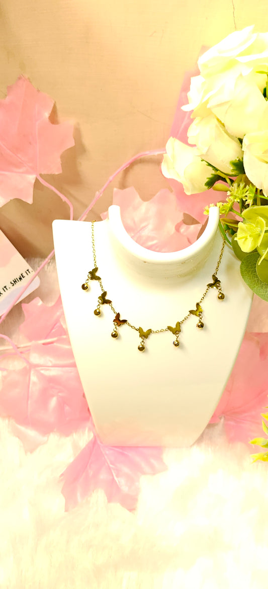 Golden Butterfly Charm Necklace by Dilverse