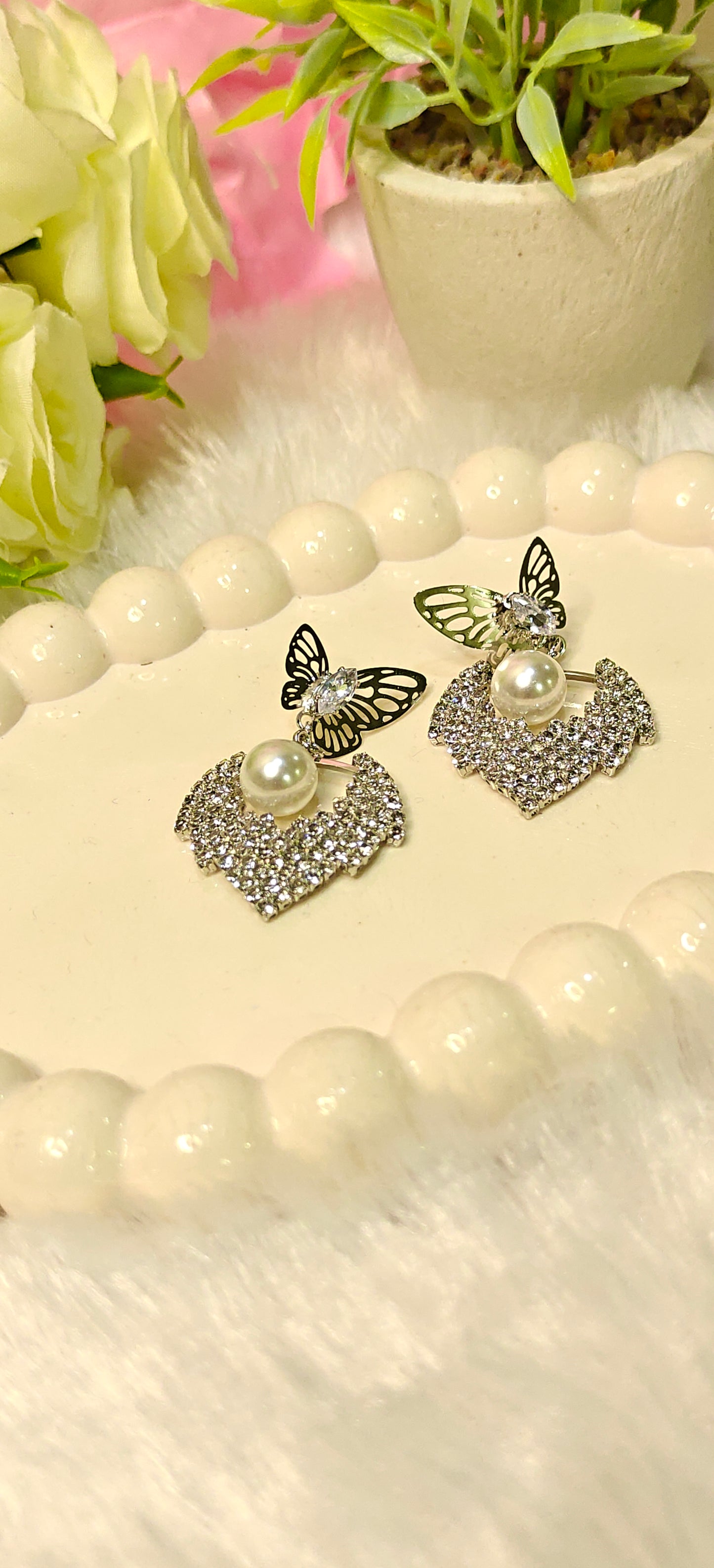 Radiant Butterfly Elegance with Pearl Sparkle at Dilverse
