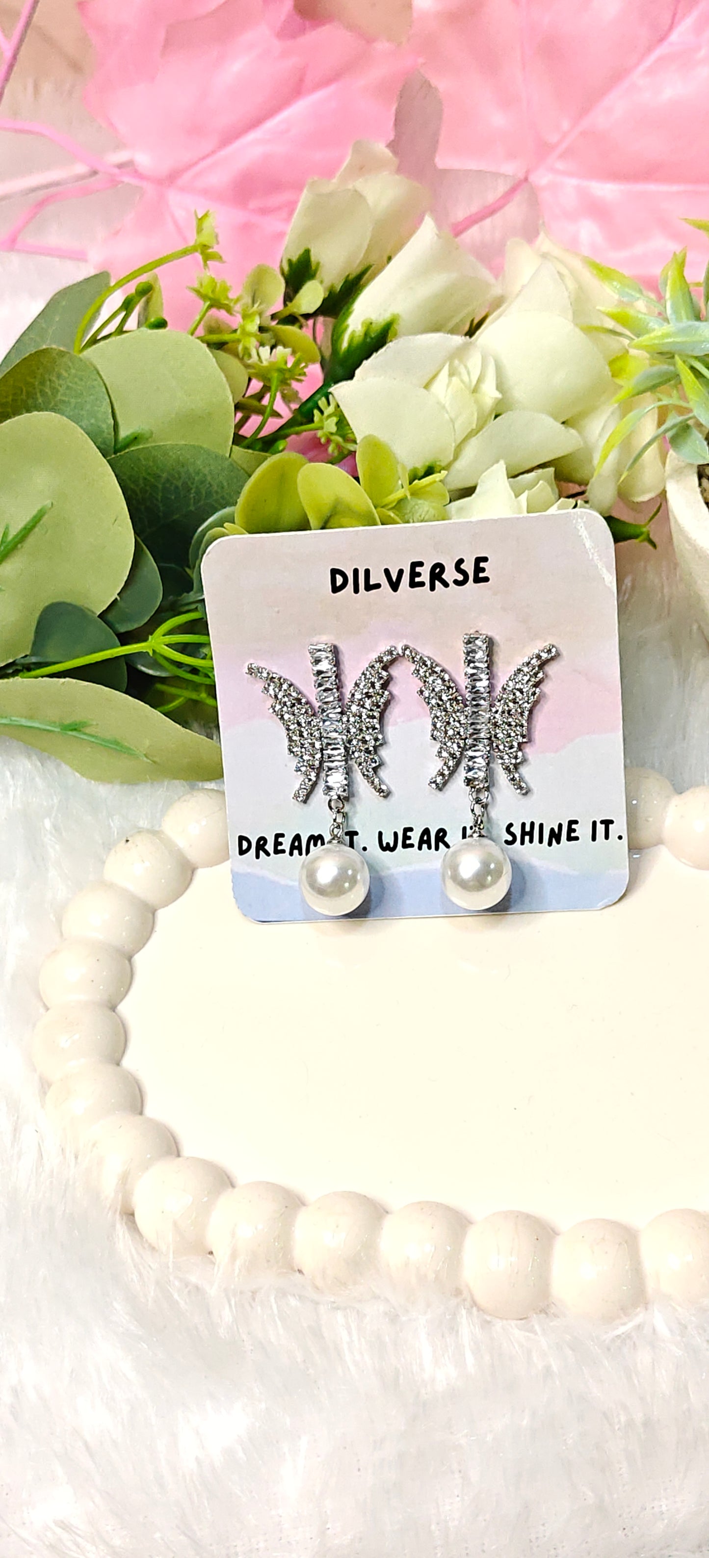 Sparkling Butterfly Crystal Earrings with Elegant Pearl Drop by Dilverse