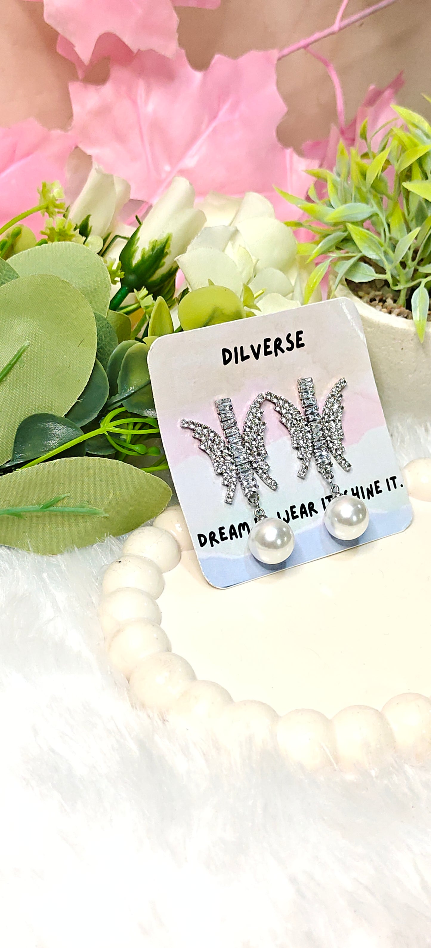 Sparkling Butterfly Crystal Earrings with Elegant Pearl Drop by Dilverse