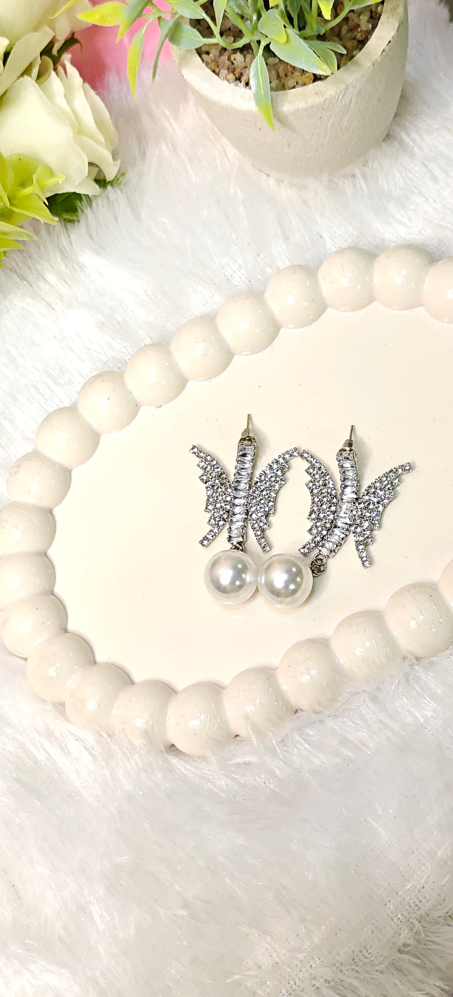Sparkling Butterfly Crystal Earrings with Elegant Pearl Drop by Dilverse