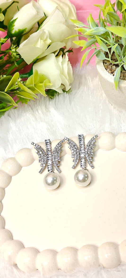 Sparkling Butterfly Crystal Earrings with Elegant Pearl Drop by Dilverse