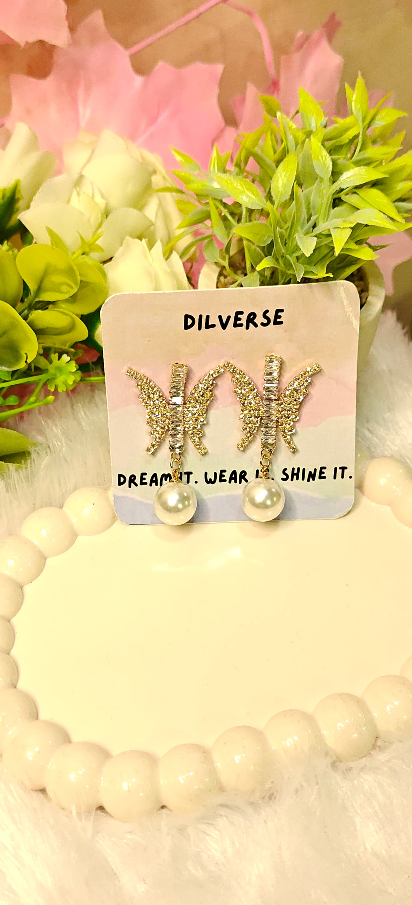 Sparkling Butterfly Crystal Earrings with Elegant Pearl Drop by Dilverse