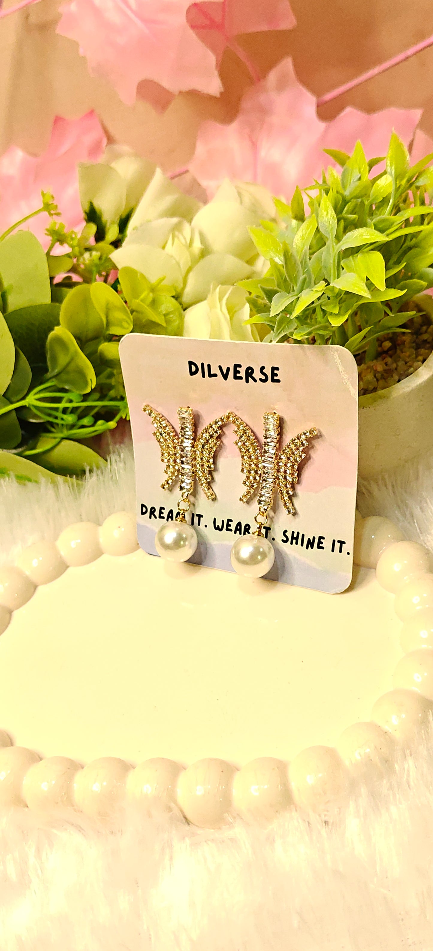 Sparkling Butterfly Crystal Earrings with Elegant Pearl Drop by Dilverse