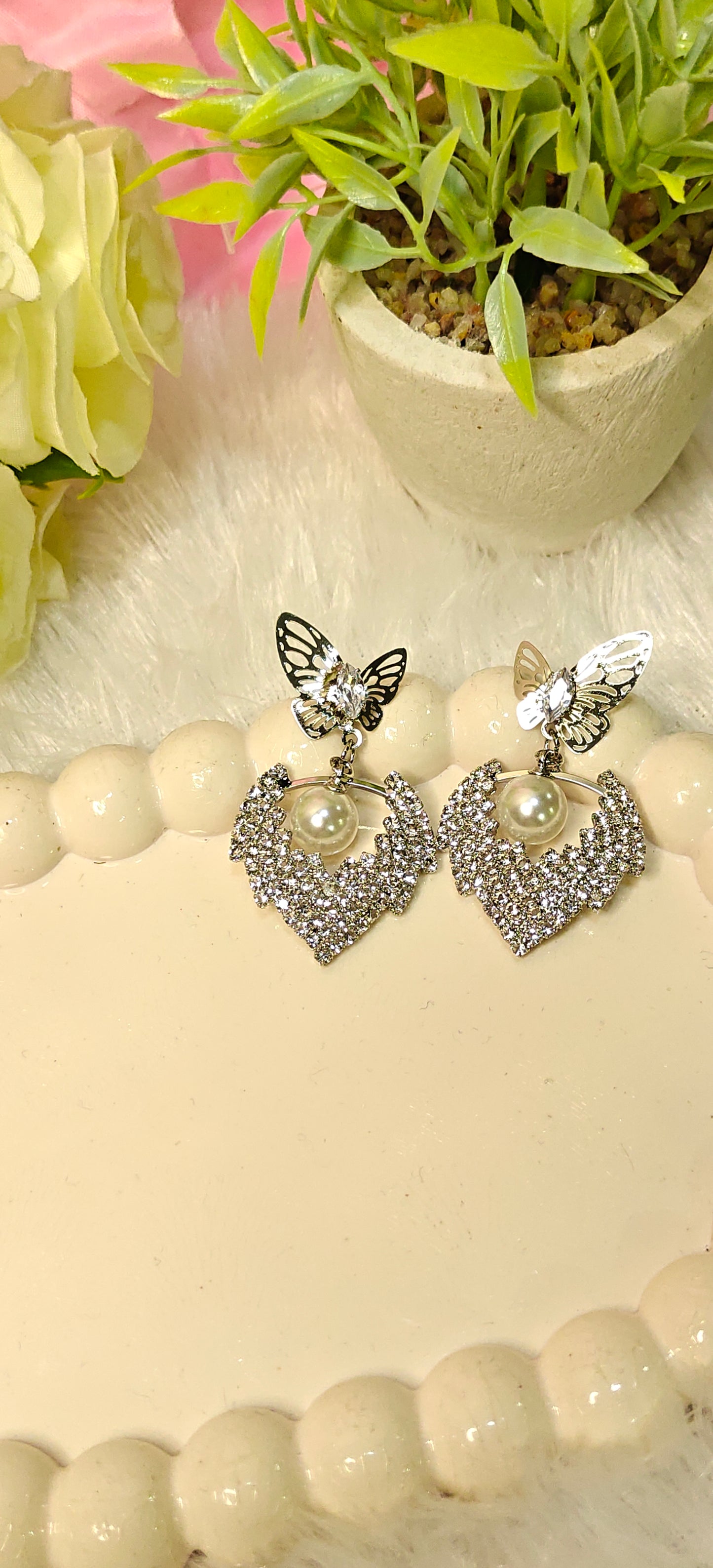 Radiant Butterfly Elegance with Pearl Sparkle at Dilverse