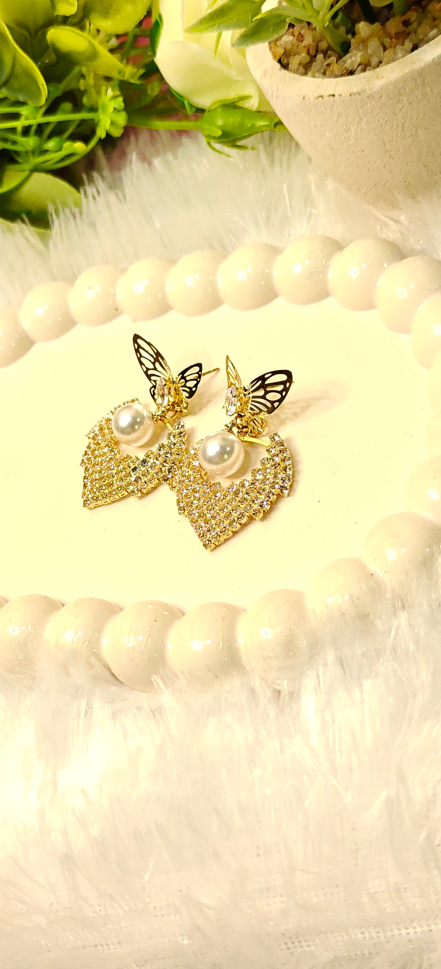 Radiant Butterfly Elegance with Pearl Sparkle at Dilverse